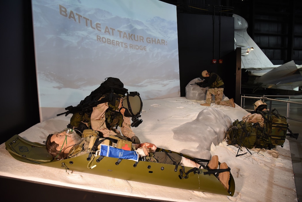 A portion of the Warrior Airmen exhibit, highlighting Airmen at Takur Ghar, on display in the Cold War Gallery at the National Museum of the U.S. Air Force. (U.S. Air Force photo by Ken LaRock)