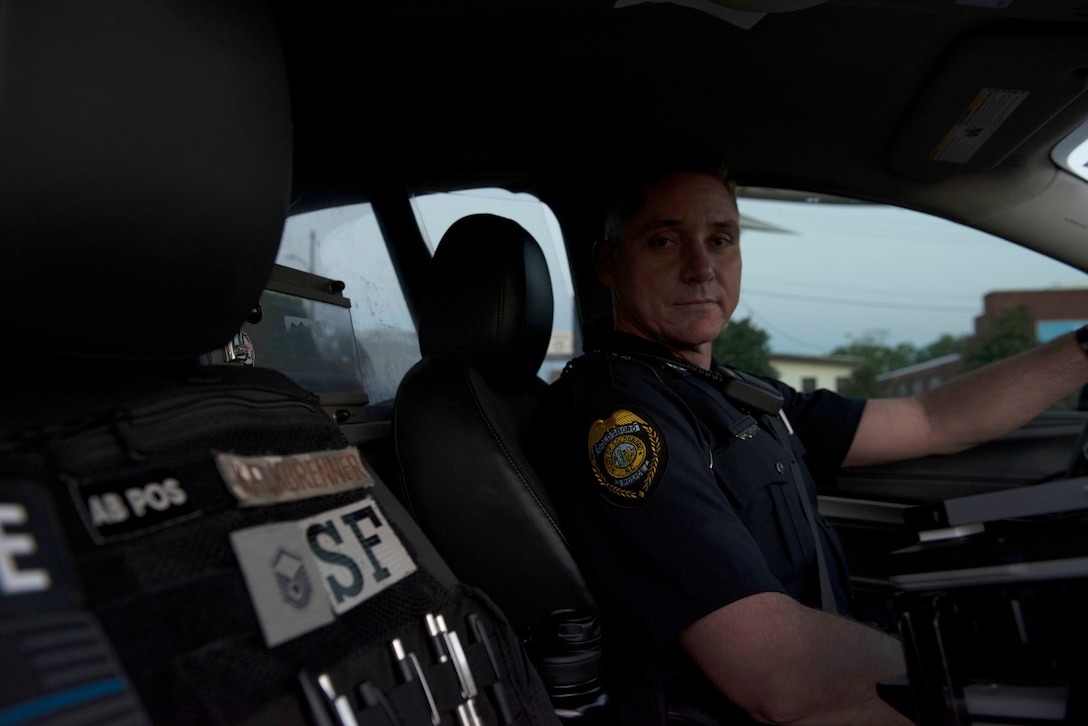 Marco Kalkbrenner, a policeman with Goldsboro Police department, prepares to take off for an evening patrol in Goldsboro, N.C., April 25, 2018 Kalkbrenner retired in 2017 as a master sergeant in the Air Force following 20 years of service as a security forces member.