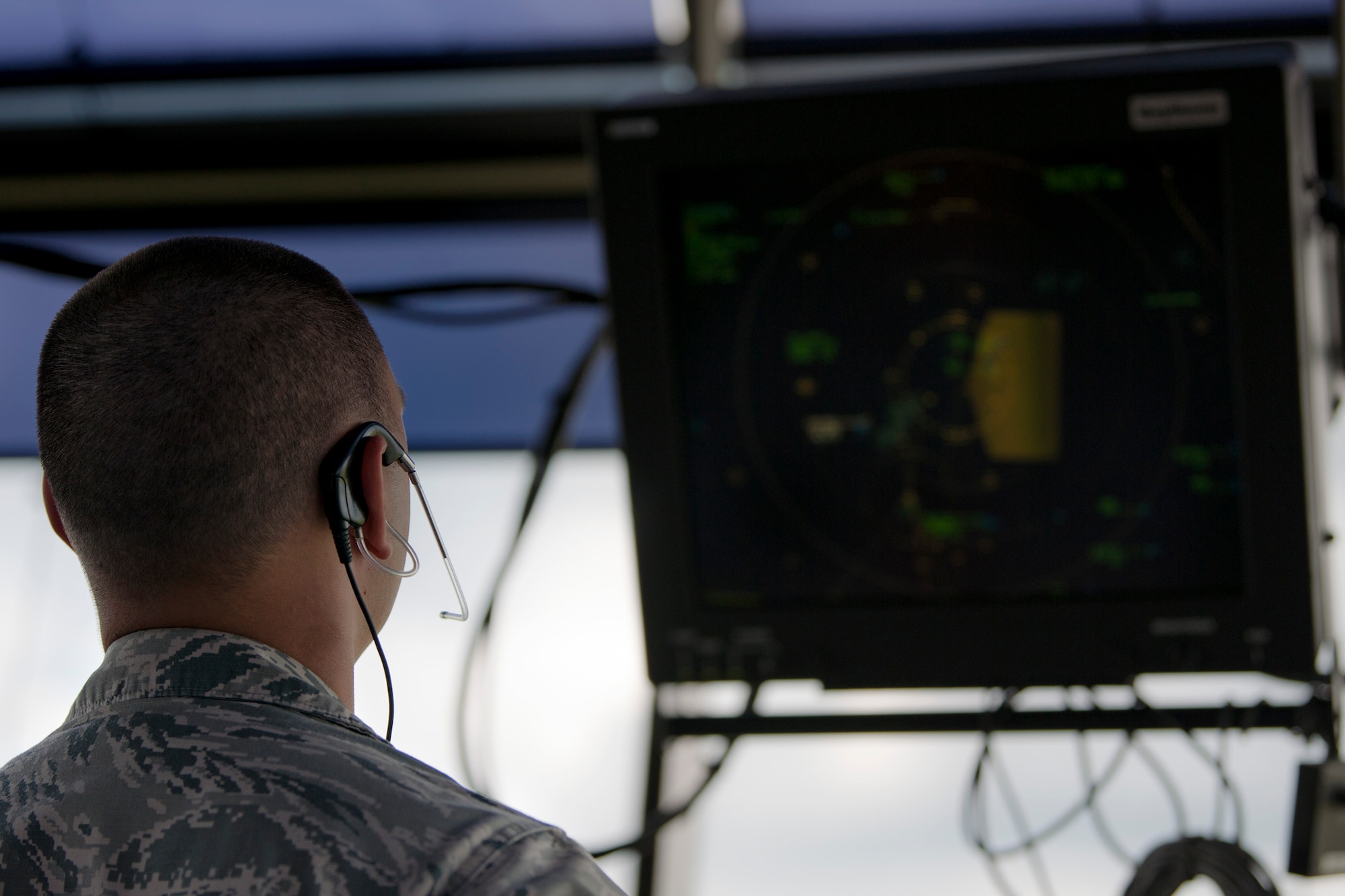 Staff Sgt. Daniel Sattar, 23d Operations Support Squadron air traffic controller, analyzes flight data, Aug. 15, 2018, at Moody Air Force Base, Ga. Air traffic controllers direct runway operations by sequencing and separating aircraft, issuing safety alerts, ensuring the safety of pilots and managing the expeditious flow of traffic. (U.S. Air Force photo by Airman Taryn Butler)