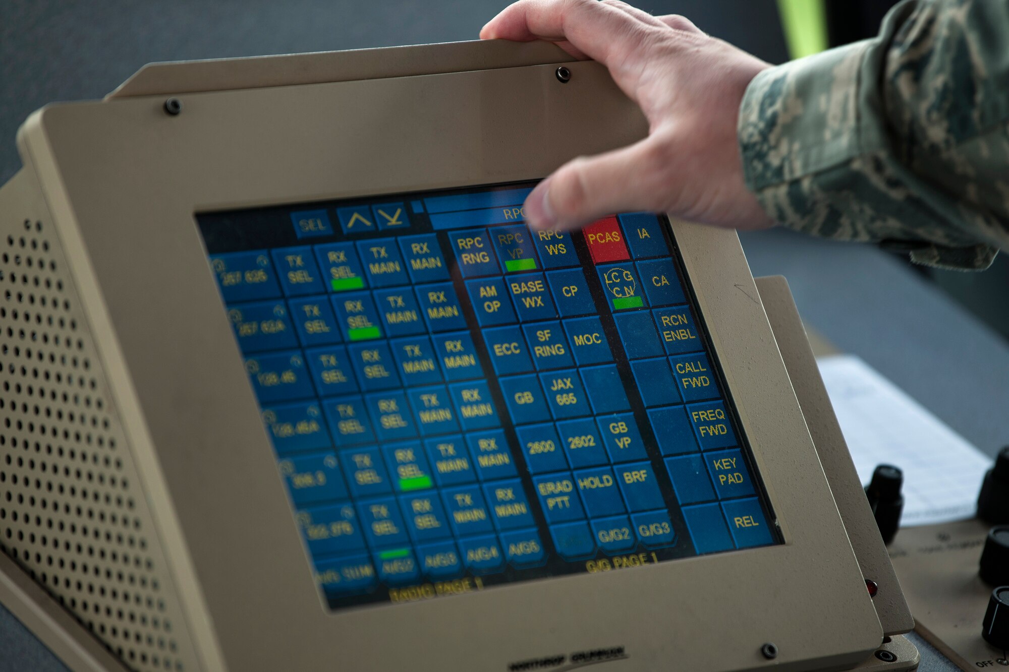 Senior Airman Jonah Sterling, 23d Operations Support Squadron air traffic controller, communicates with other facilities regarding flights using an enhanced terminal voice switch, Aug. 15, 2018, at Moody Air Force Base, Ga. Air traffic controllers direct runway operations by sequencing and separating aircraft, issuing safety alerts, ensuring the safety of pilots and managing the expeditious flow of traffic. (U.S. Air Force photo by Airman Taryn Butler)