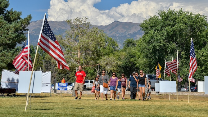 Families gather at Centennial Park for the 18th annual Salute Picnic Aug. 17, 2018, at Hill Air Force Base, Utah. Nearly 3,500 people attended the event sponsored by the Top of Utah Military Affairs Committee. (U.S. Air Force photo by R. Nial Bradshaw)