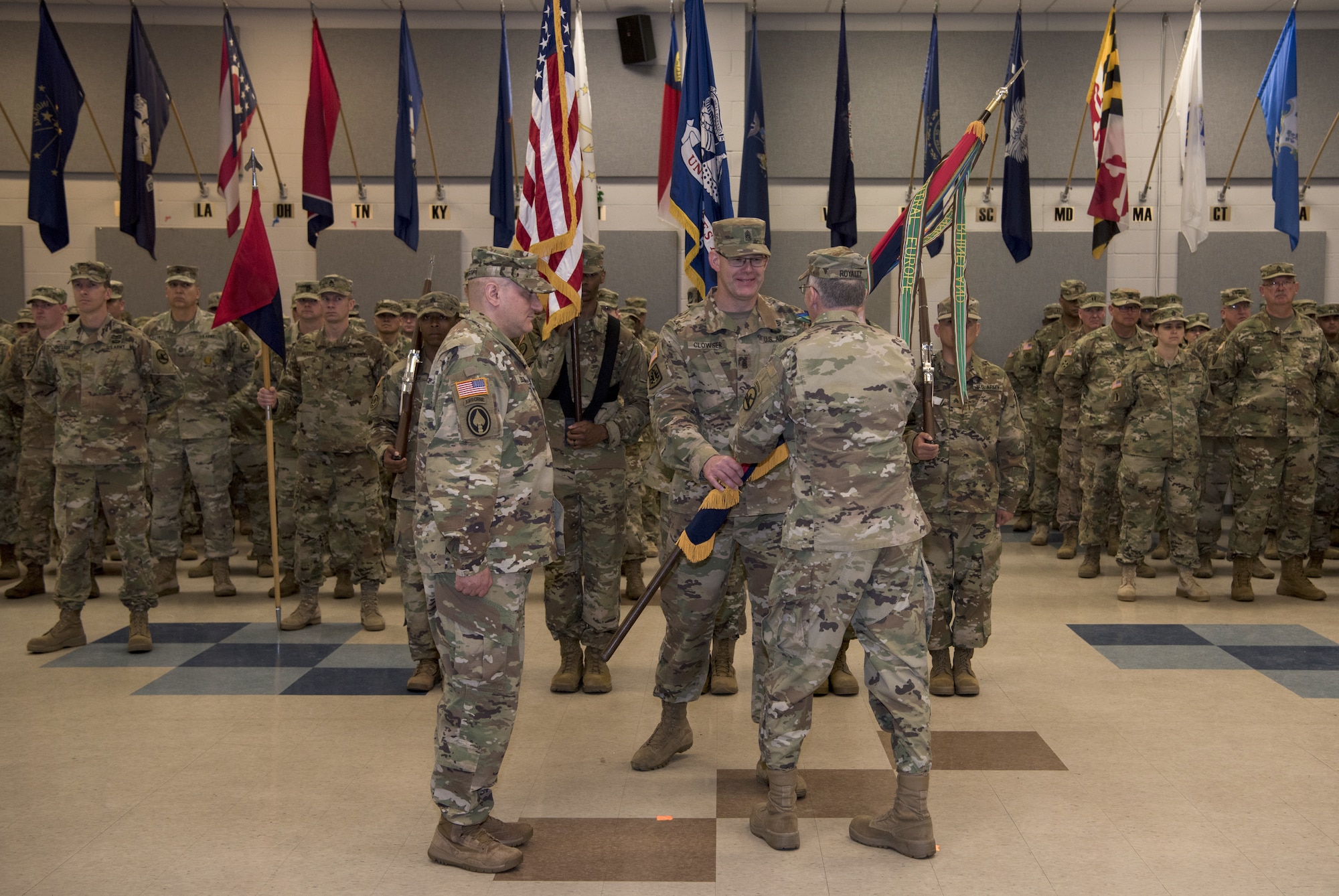 Command Sgt. Maj. Richard C. Clowser, 78th Training Division, passes the guidon to U.S. Army Maj. Gen. A. Ray Royalty, the previous 78th Training Division commanding general, during a change of command ceremony on Joint Base McGuire-Dix-Lakehurst, N.J., Aug. 11, 2018. Royalty gave command to U.S. Army Brig. Gen. Joseph Lestorti, 78th Training Division commanding general.