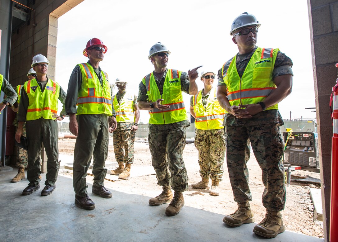 Senior leadership of 3rd Marine Aircraft Wing and Marine Corps Air Station Miramar, Calif., tour the construction site of a new microgrid at MCAS Miramar, Aug. 20. MCAS Miramar and Naval Facilities Engineering Command are working on the project, which will utilize renewable energy to provide redundant power in the event of a local grid failure. (U.S. Marine Corps photo by Lance Cpl. Juan Anaya)