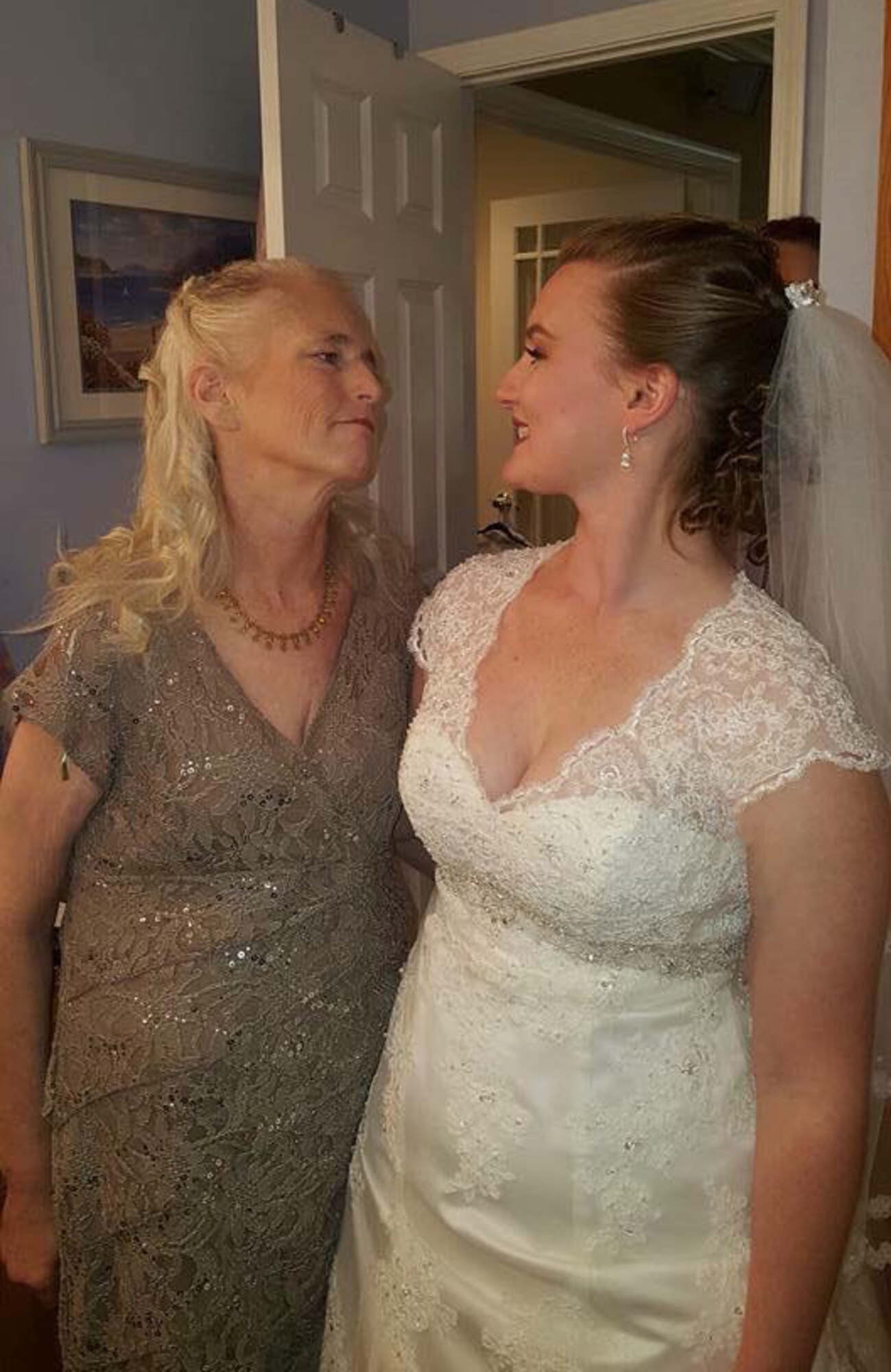 Mary Nevins and her daughter, Denise, share a smile on Denise’s wedding day in Foley, Minn., Sept. 17, 2016. Mary’s daughter, now Senior Airman Denise Jenson, currently works at the 28th Bomb Wing Public Affairs office at Ellsworth Air Force Base, S.D. (Courtesy photo)