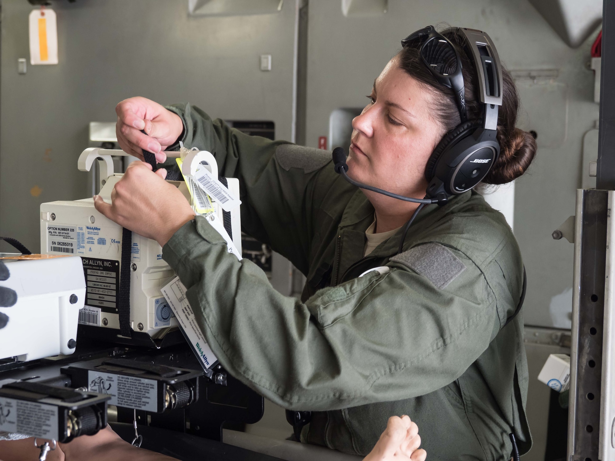 Staff Sgt. Nicole Richards, 81st Medical Group, Keesler AFB, Miss., prepares life support equipment for critical care transport. (Air Force Photo/Paul Zadach)