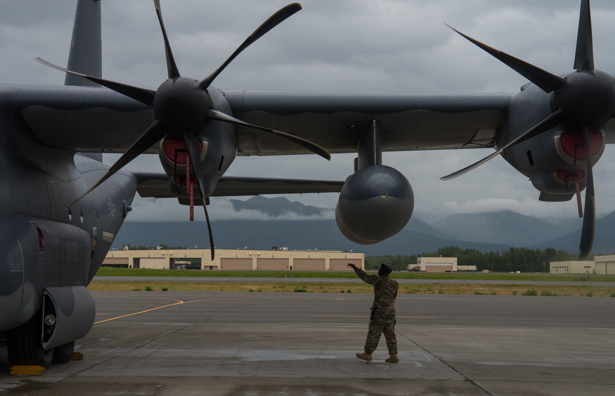U.S. Air Force Master Sgt. Rick Moore, 353rd Special Operations Maintenance Squadron productions superintendent, performs a pre-flight inspection on a C-130J Super Hercules from Kadena Air Force Base, Japan, during Red Flag-Alaska 18-3 at Joint Base Elmendorf-Richardson, Alaska, Aug. 13, 2018. RF-A serves as an ideal platform for international engagement and the exercise has a long history of including allies and partners, ultimately enabling all involved to exchange tactics, techniques and procedures while improving interoperability.