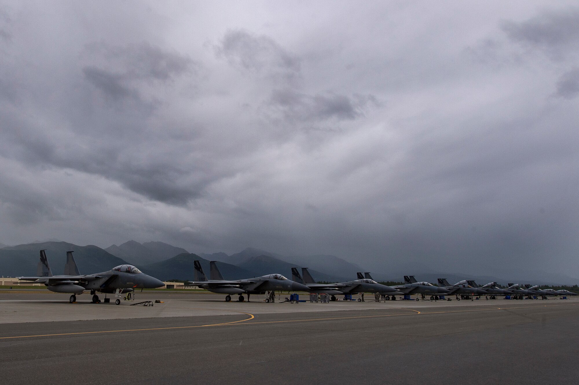 F-15C Eagle aircraft from the 144th Fighter Wing, Fresno Air National Guard Base, California, rest on the flightline during Red Flag-Alaska 18-3 at Joint Base Elmendorf-Richardson, Alaska, Aug. 13, 2018. RF-A is a Pacific Air Forces-directed field training exercise for U.S. and international forces flown under simulated air combat conditions. RF-A serves as an ideal platform for international engagement and the exercise has a long history of including allies and partners, ultimately enabling all involved to exchange tactics, techniques and procedures while improving interoperability.