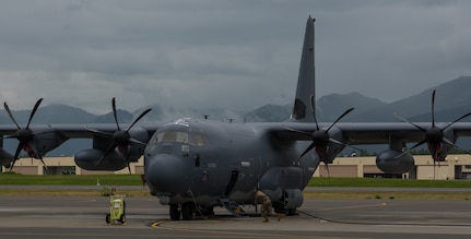 U.S. Air Force Airman 1st Class Christopher Szutenbach, 353rd Special Operations Maintenance Squadron crew chief, connects a power cart to a C-130J Super Hercules from Kadena Air Force Base, Japan, during Red Flag-Alaska at Joint Base Elmendorf-Richardson, Alaska, Aug. 13, 2018. RF-A is a Pacific Air Forces-directed field training exercise for U.S. and international forces flown under simulated air combat conditions. RF-A exercises are focused on improving the combat readiness of U.S. and international forces and providing training for units preparing for air expeditionary force taskings.