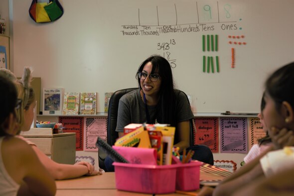 Scott Priscilla, third grade schoolteacher, reads a story to children attending Laughlin Air Force Base, Texas’ newly opened science, technology, engineering and mathematics school, Aug. 22, 2018. The arrival and opening of the school brings new opportunities to the San Felipe Del Rio Independent School District and the base, while also being the first STEM school ever built on a military installation.