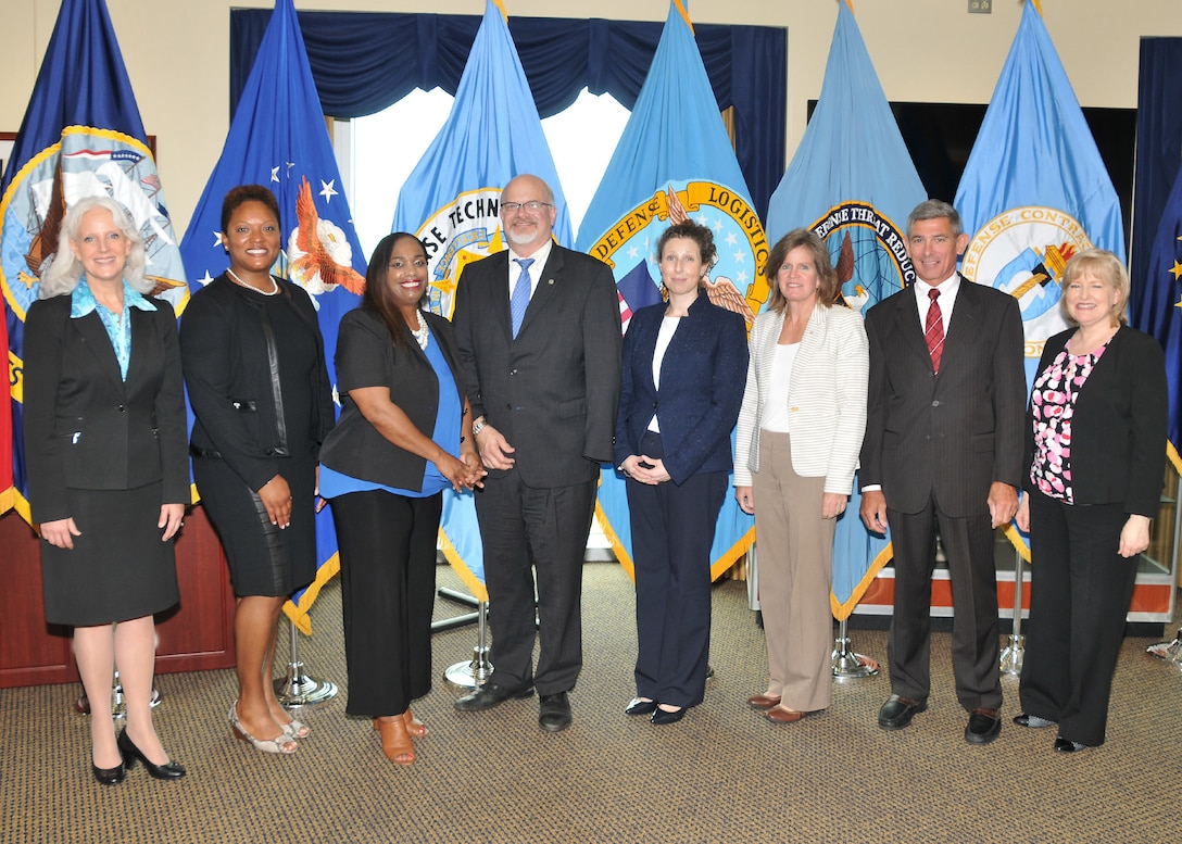 Women's Equality Day panelists pose with senior leaders from DCAA, DTIC, DLA and DTRA.