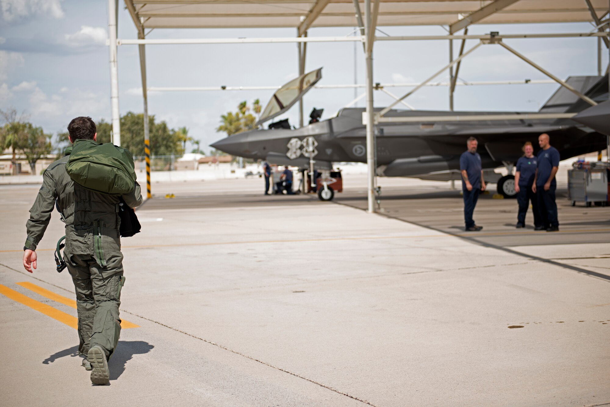 Capt. Anthony Ortiz, 62nd Fighter Squadron F-35A Lightning II pilot, heads to his jet for a sortie Aug. 22, 2018, at Luke Air Force Base, Ariz.