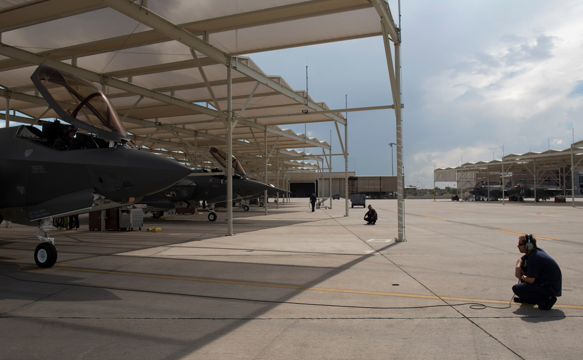 Lockheed Martin maintainers from the 62nd Aircraft Maintenance Unit prepare to taxi out several F-35A Lightning IIs for a sortie Aug. 22, 2018, at Luke Air Force Base, Ariz.