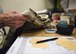 Jane Herron, Davis-Monthan Thrift Shop volunteer worker, sorts and inventories donations at D-M Air Force Base, Ariz., August 22, 2018.