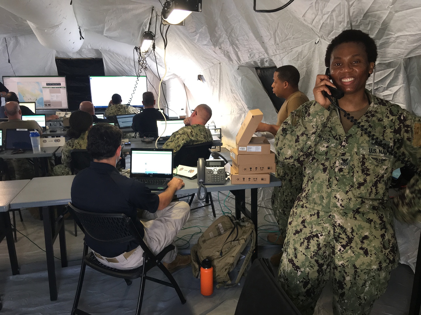 Petty Officer 1st Class Angelica Mathis, JTF-CS communications specialist, conducts a radio check with the PRC-150 during a recent exercise. (Photo by Navy Mass Communication Specialist 3rd Class Michael Redd)