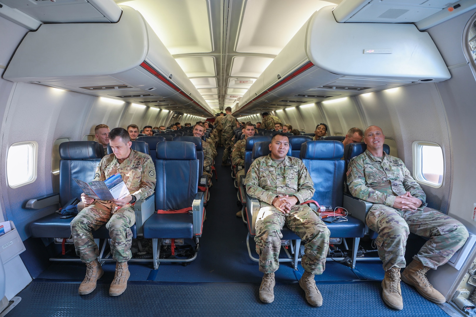 Soldiers assigned to the 3rd Squadron, 2nd Cavalry Regiment prepare for departure aboard an aircraft at the Nuremberg Airport, Germany, July 26, 2018. The Department of Defense announced in August 2018 a contract award aimed at overhauling the Defense Travel System.