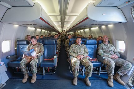 Soldiers assigned to the 3rd Squadron, 2nd Cavalry Regiment prepare for departure aboard an aircraft at the Nuremberg Airport, Germany, July 26, 2018. The Department of Defense announced in August 2018 a contract award aimed at overhauling the Defense Travel System.