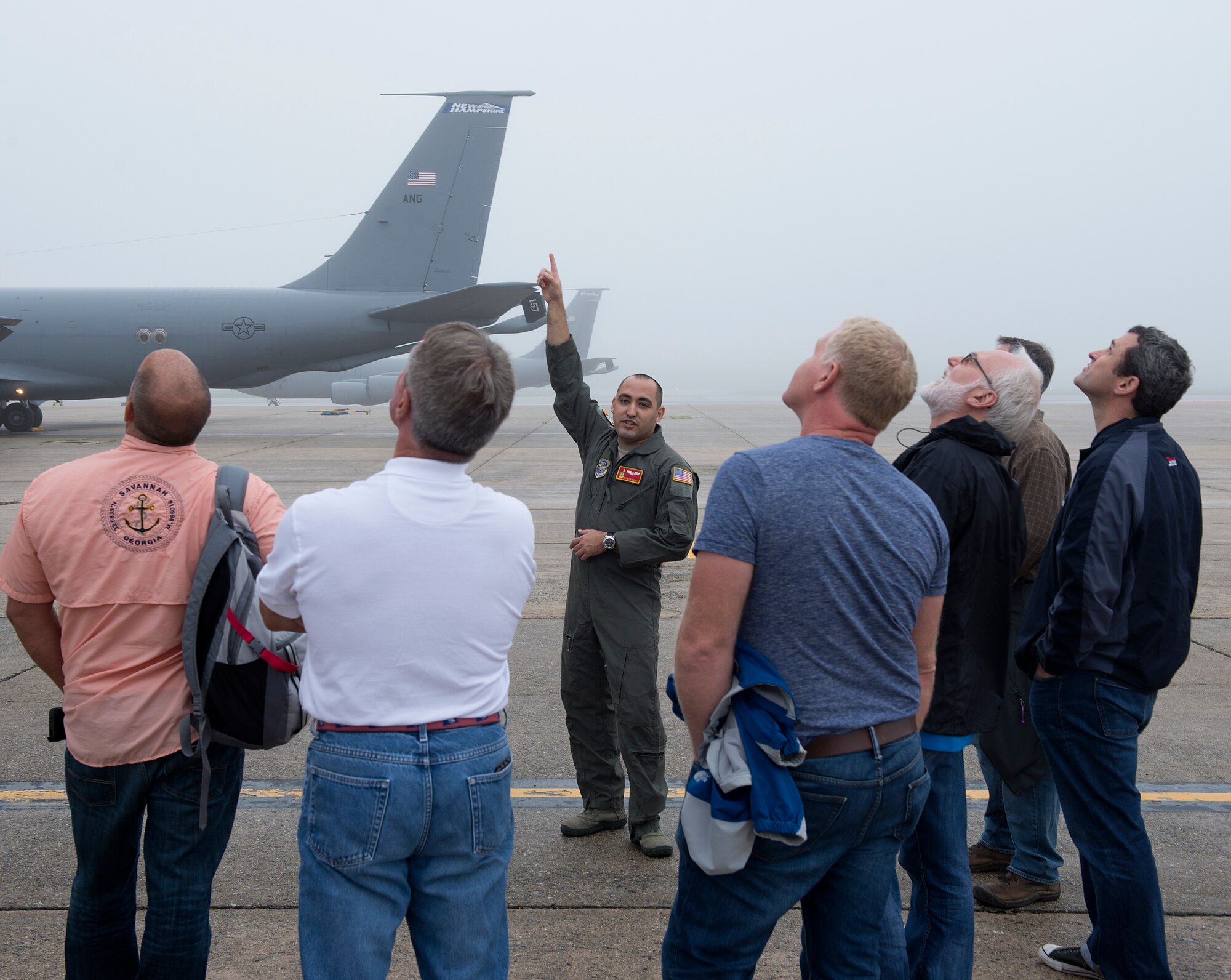 Staff Sgt. Hector M. Acevedo II, a 64th Air Refueling Squadron boom operator, gives local employers a tour of a KC-135 Stratotanker on Aug. 14, 2018 at Pease Air National Guard Base, N.H. The tour preceded a trip to Camp Grayling, Michigan where their employees, soldiers assigned to the 197th Field Artillery Brigade, N.H. Army National Guard, conducted their annual training. (Photo by Staff Sgt. Kayla White, 157th Air Refueling Wing Public Affairs)