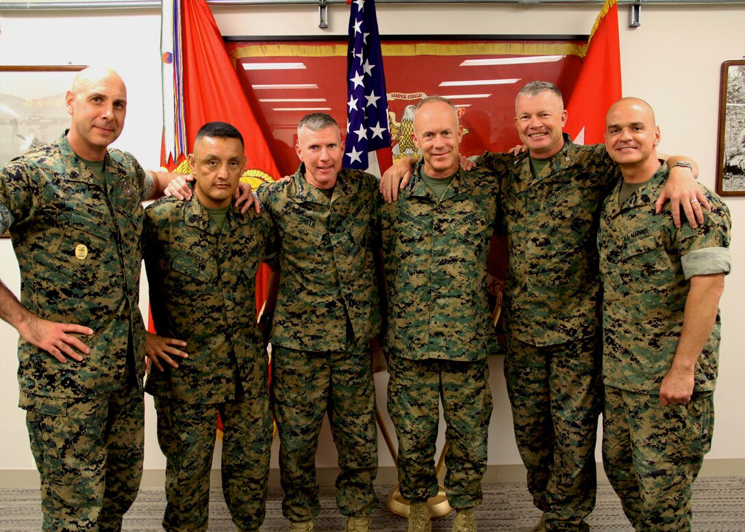 USAG CAMP HUMPHREYS, Korea -- Lt. Gen. Eric M. Smith, commanding general, III Marine Expeditionary Force, and the III MEF command team, visits Maj. Gen. Patrick J. Hermesmann, commander, U.S. Marine Corps Forces Korea, and the MARFORK command team, here Aug. 22.  (Photo by Capt. John J. Parry)