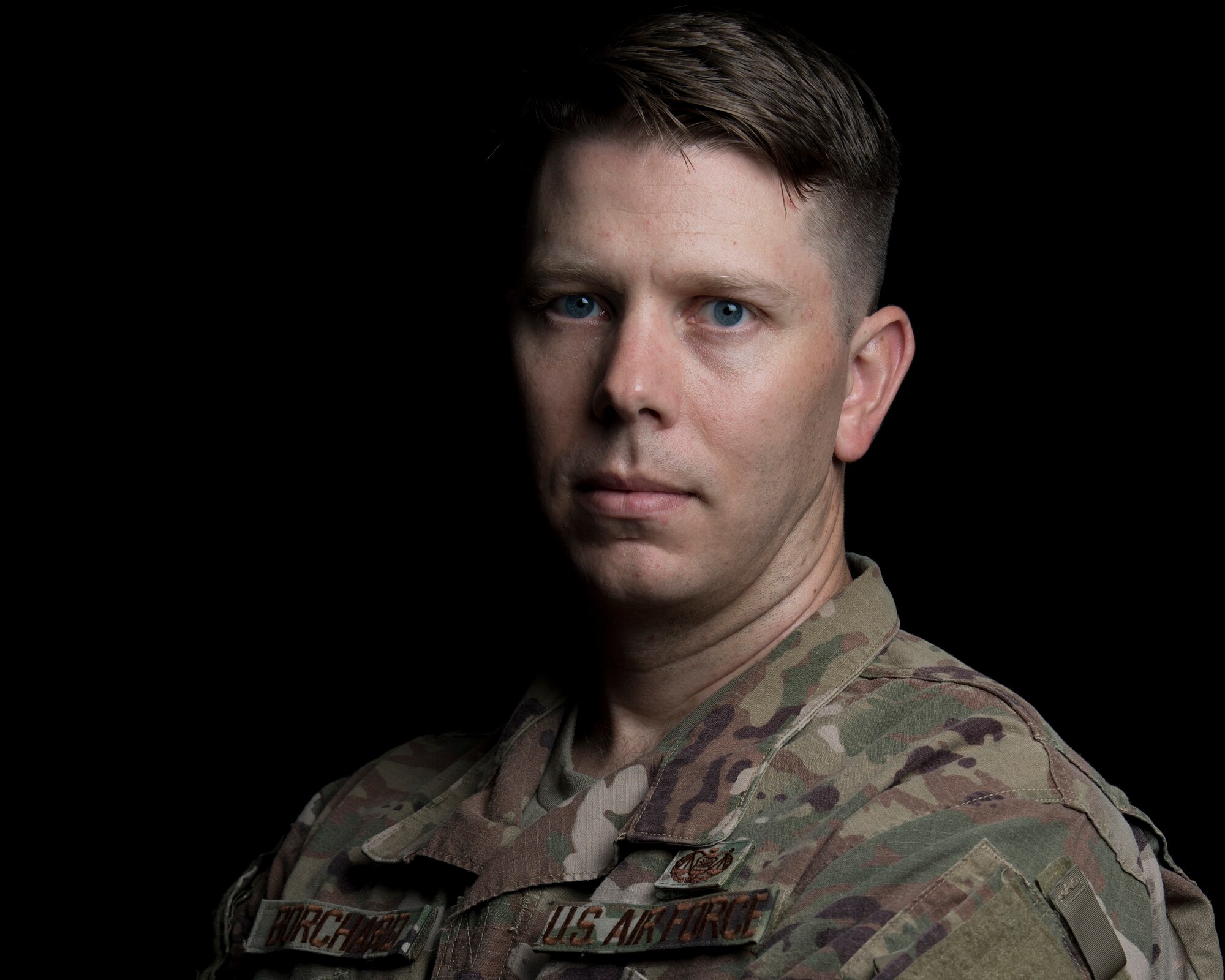 U.S. Air Force Capt. Koley Borchard a Deputy Staff Judge Advocate for the 380th Air Expeditionary Wing poses for a photo at Al Dhafra Air Base, August 22, 2018. (U.S. Air Force photo by: Tech. Sgt. Nieko Carzis)