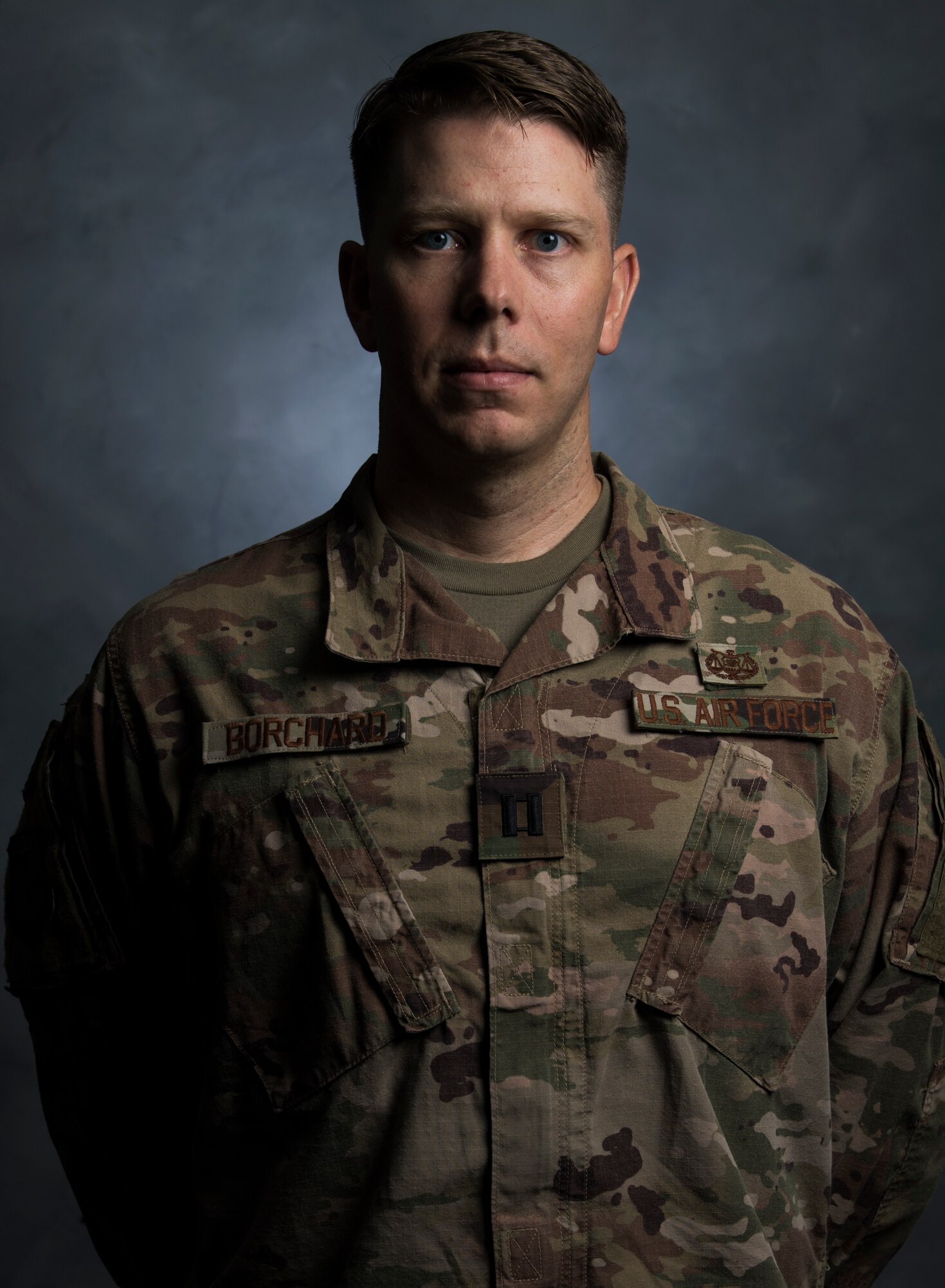 U.S. Air Force Capt. Koley Borchard a Deputy Staff Judge Advocate for the 380th Air Expeditionary Wing poses for a photo at Al Dhafra Air Base, August 22, 2018. (U.S. Air Force photo by: Tech. Sgt. Nieko Carzis)