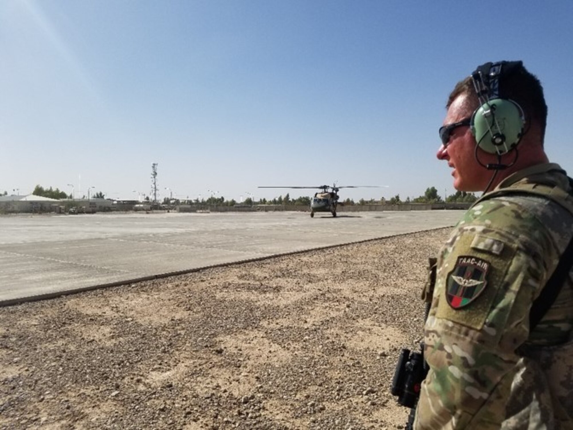 CAMP SHORAB, Afghanistan (July 4, 2018) -- Afghan Air Force (AAF) UH-60s hover taxi for the first time after deploying to Camp Shorab, Afghanistan, July 4, 2018. The deployment of the UH-60s provides new pilots operational experience and helps equip them for working in more complex environments. (U.S. Marine Corps photo by Sgt. Luke Hoogendam)