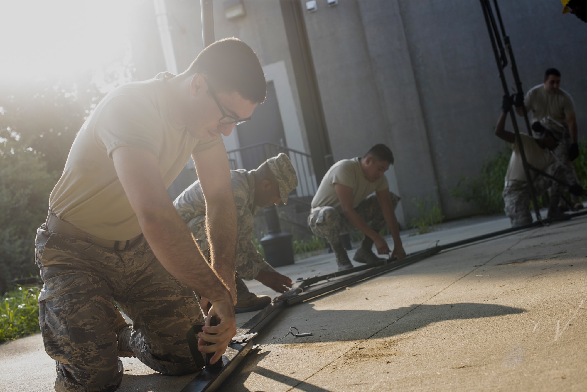 Airmen with the 87th Force Support Squadron put together a tent during a Single Pallet Expeditionary Kitchen training exercise on Joint Base McGuire-Dix-Lakehurst, N.J., Aug. 17, 2018. The SPEK is part of a home station readiness training that occurs every 18 months and is required for the services career field to complete.