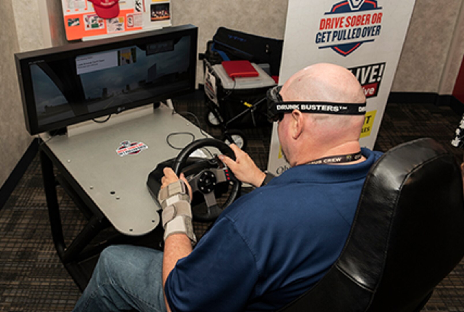 Land and Maritime associate tests out an impairment simulator