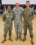 From left, Navy Petty Officer 1st Class Vincent Smith, Air Force Command Chief Master Sgt. Ronald C. Anderson Jr., and Marine Corps Staff Sgt. Jordan Freking pose for a photo during the Air National Guard Enlisted Leadership Symposium at Camp Dawson, W. Va. Anderson is the twelfth command chief master sergeant for the Air National Guard. Smith is a logistics specialist,  and Freking is a planner who works with Global Force Management and with the Joint Operations Planning and Execution System, or JOPES at Joint Task Force Civil Support. JTF-CS is a total force, comprised of active, Reserve and Guard members from the Army, Navy, Air Force and Marines, as well as civilians. Once assigned, members receive additional training tailored to prepare them for upcoming missions. (Courtesy photo)
