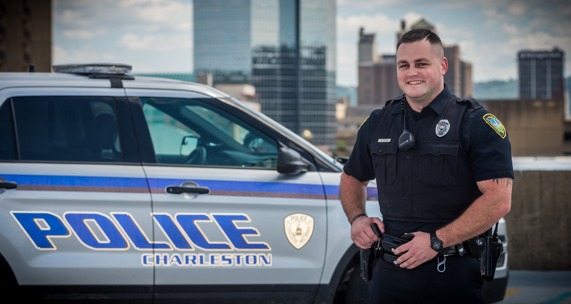 Portrait of Zach Cyrus, a Maintenance Operations Command Airman and Charleston, W.Va. city cop. (West Virginia National Guard Photo by Bo Wriston)