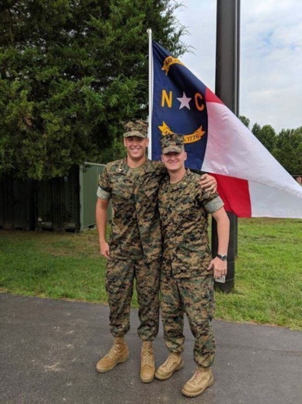 Marine Corps 2nd Lt. Zachary Bowman stands proud with his officer selection officer, Marine Corps Maj. Trey B. Kennedy, on graduation day at Officer Candidates School, Quantico, Va., Aug. 11, 2018. Bowman lost more than 40 pounds on his journey to become a Marine Corps officer. Bowman will pursue the military occupational specialty of judge advocate after Basic School. Courtesy photo