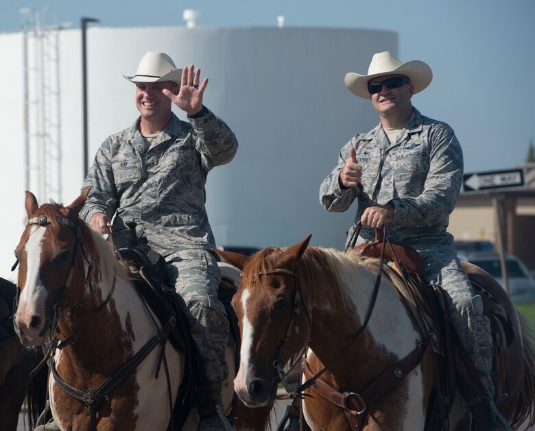 Chief Kay and Colonel Carney on horseback.