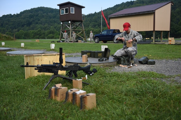 U.S. Air Force Tech. Sgt. Rickelle Groover, Combat Arms Training and Maintenance Instructor, prepares a weapons range for use at Camp Dawson, W. Va., Aug. 6, 2018. Groover and other guardsmen from the 171st Security Forces Squadron, located at the 171st Air Refueling Wing near Pittsburgh, traveled to Camp Dawson, August 5-8, 2018, to familiarize and qualify on the 240B and 249 machine guns. (U.S. Air National Guard photo by Tech. Sgt. Allyson L. Manners)