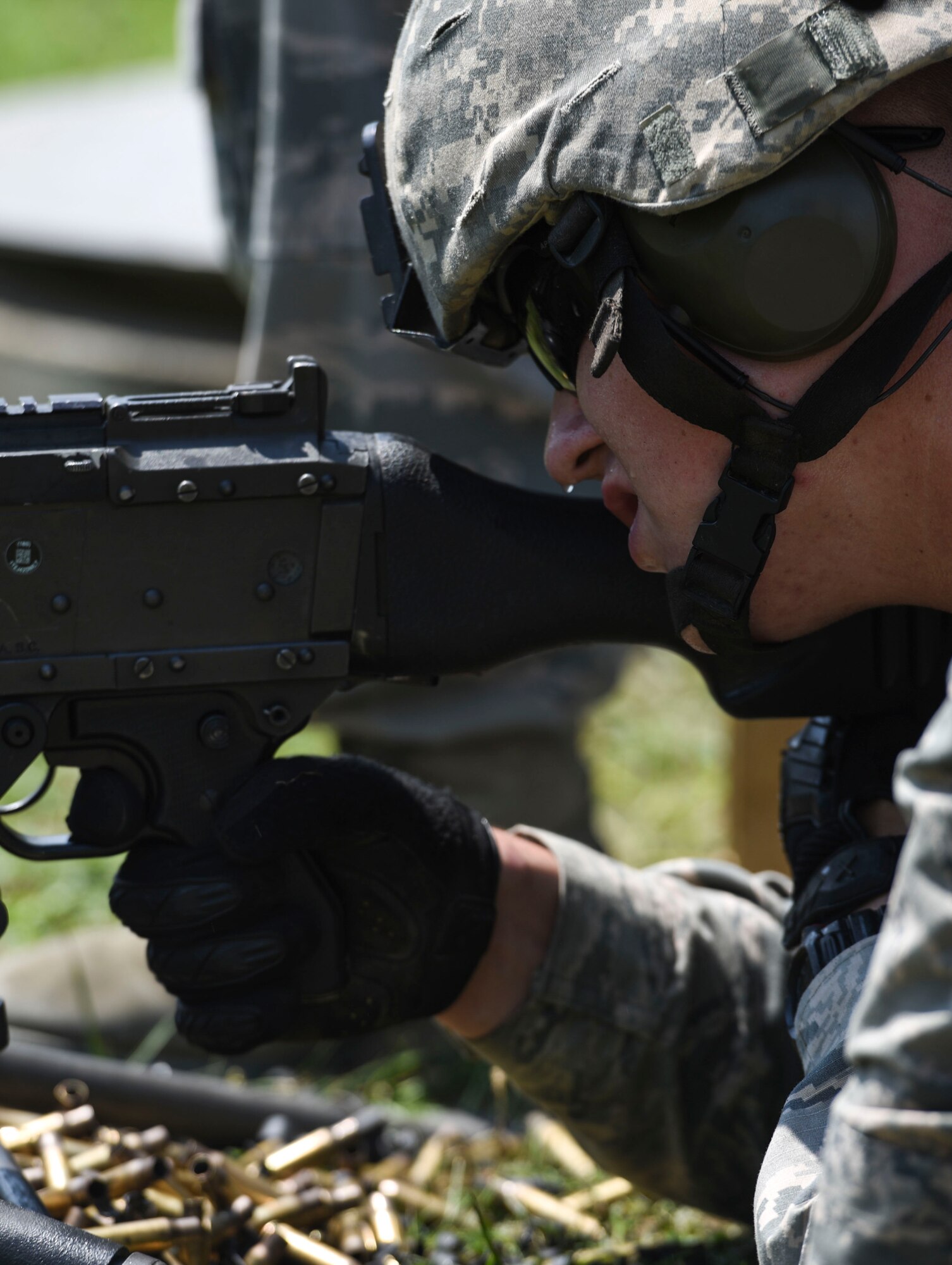 U.S. Air Force Airman 1st Class Joshua Snyder, Security Forces Specialist, 171st Security Forces Squadron, fires a 249 machine gun during a weapons qualification at Camp Dawson, W. Va., Aug. 6, 2018. Guardsmen from the 171SFS, located at the 171st Air Refueling Wing near Pittsburgh, traveled to Camp Dawson, August 5-8, 2018, to familiarize and qualify on the 240B and 249 machine guns. (U.S. Air National Guard photo by Tech. Sgt. Allyson L. Manners)