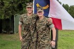 Marine Corps 2nd Lt. Zachary Bowman stands proud with his officer selection officer, Marine Corps Maj. Trey B. Kennedy, on graduation day at Officer Candidates School, Quantico, Va., Aug. 11, 2018. Bowman lost more than 40 pounds on his journey to become a Marine Corps officer. Bowman will pursue the military occupational specialty of judge advocate after Basic School. Courtesy photo