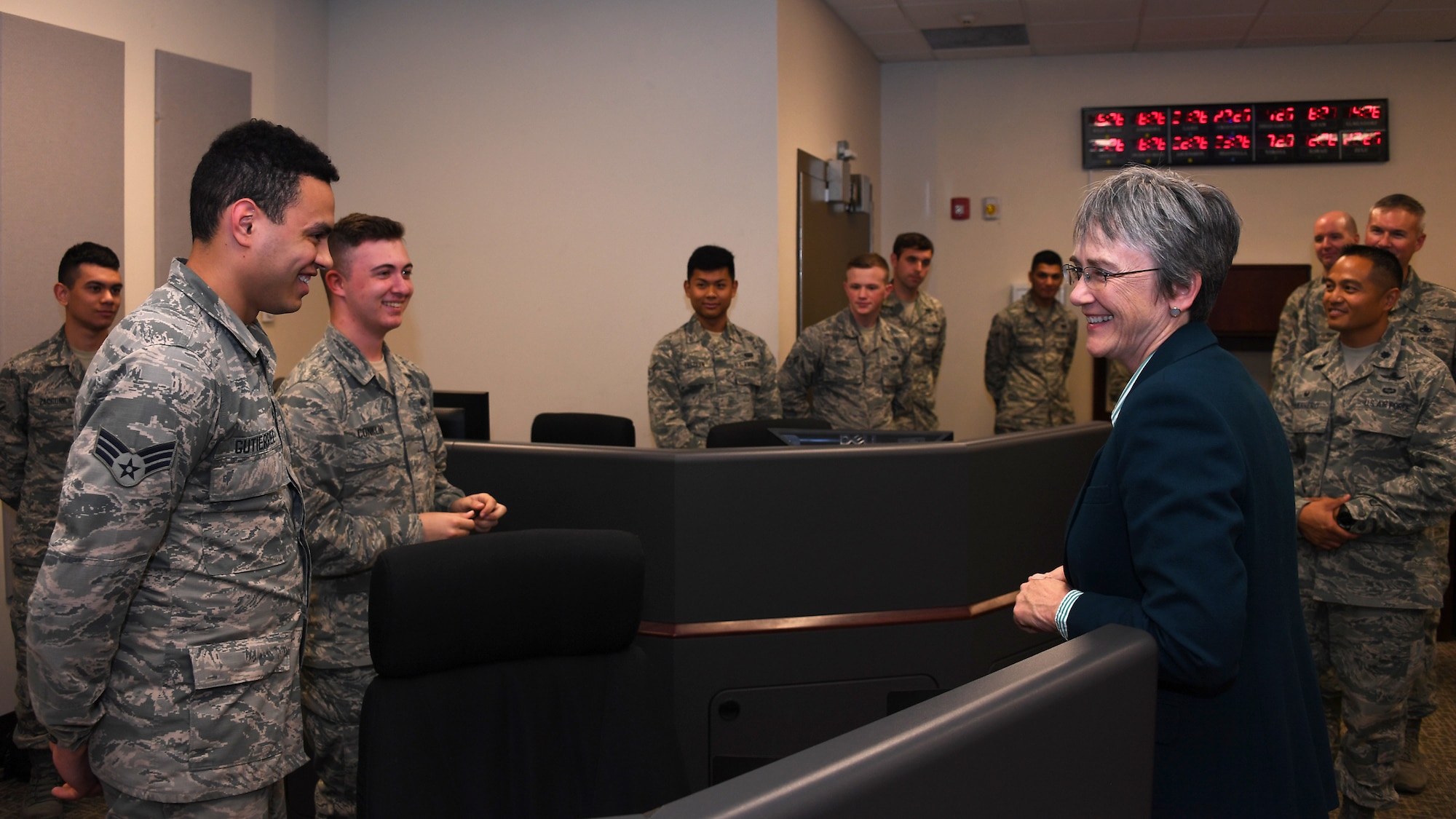Secretary of the Air Force Heather Wilson speaks with Senior Airman Wilfredo Gutierrez, High Frequency Global Communications Squadron technician with the 319th Communications Squadron, August 20, 2018 on Grand Forks Air Force Base, North Dakota. Wilson visited the 319 CS during a tour of Grand Forks AFB in order to learn more about the mission and its relevance to Air Force operations. (U.S. Air Force photo by Airman 1st Class Elora J. Martinez)