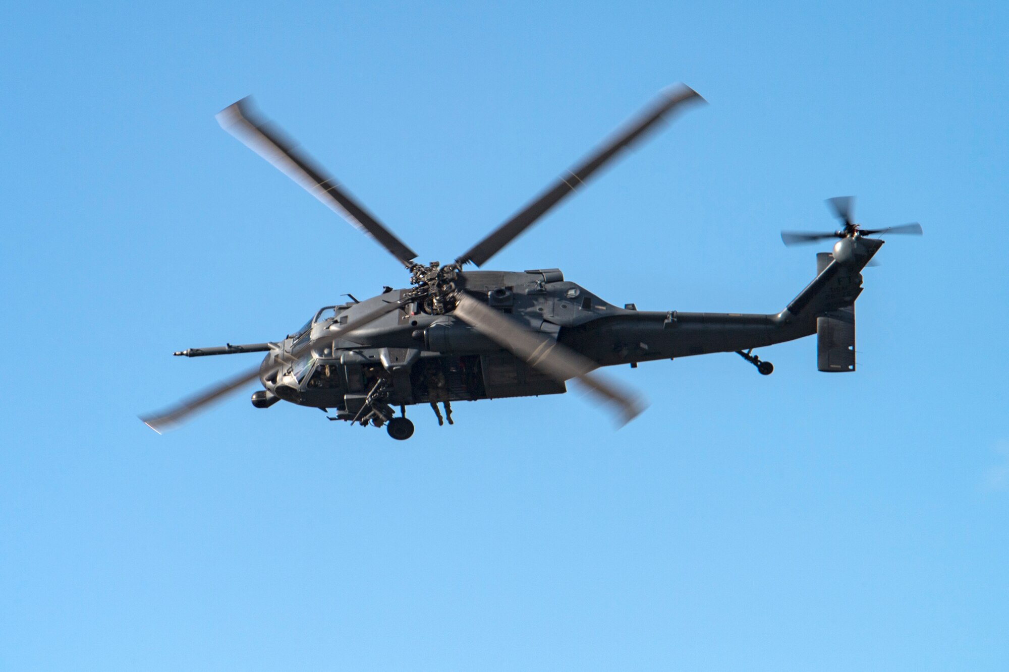 An HH-60G Pave Hawk executes tactical maneuvers, Aug. 15, 2018, at Avon Park Air Force Range, Fla. Airmen from the 41st Rescue Squadron and 41st Helicopter Maintenance Unit traveled to Patrick Air Force Base, Fla. to participate in a spin-up exercise. During the exercise, Airmen faced scenarios and situations they may encounter downrange. (U.S. Air Force photo by Senior Airman Janiqua P. Robinson)