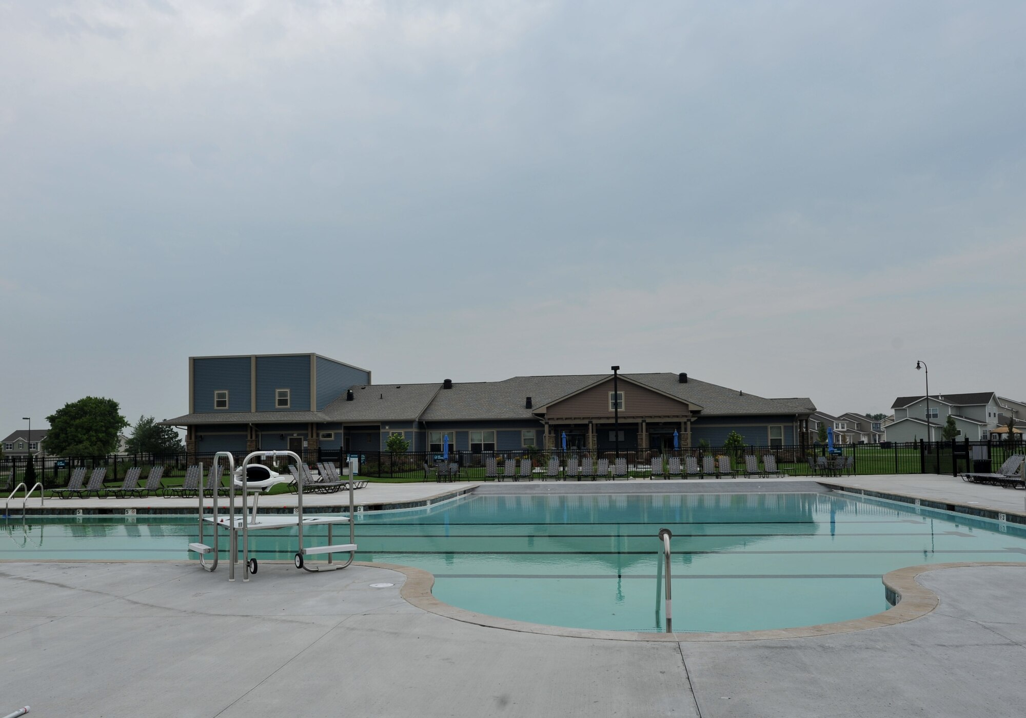 The view of the pool and the outside of the Red Raiders community Center at McConnell AFB, Kansas. The community center was named Red Raiders in honor of the 22nd Bombardment Group with the same name. (U.S. Air Force photo by Staff Sgt. David Bernal Del Agua)