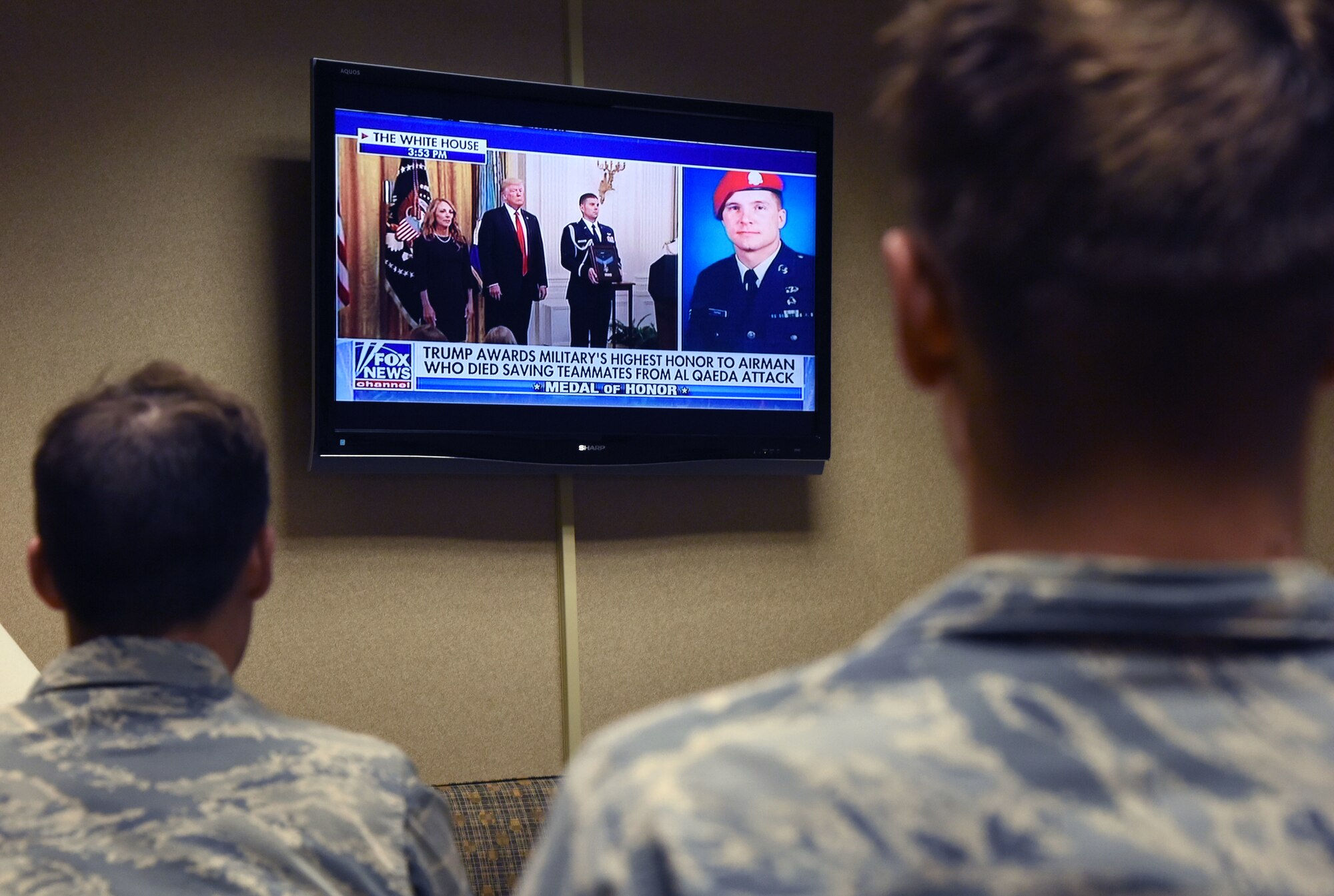 Airmen in the 334th Training Squadron watch a televised Medal of Honor presentation at Cody Hall at Keesler Air Force Base, Mississippi, Aug. 23, 2018. Tech. Sgt. John Chapman was posthumously awarded the Medal of Honor, the nation�s highest award for valor in combat, by U.S. President Donald Trump. Chapman was killed in Afghanistan on March 4, 2002. (U.S. Air Force photo by Kemberly Groue)