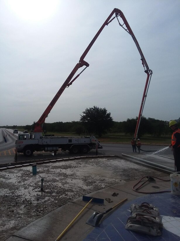 U.S. Air Force Airmen with the 7th Civil Engineer Squadron prepare to fill the top layer of the traffic circle with cement during the beautification project taking place between July 8, 2018 and Aug. 7, 2018 at Dyess Air Force Base, Texas.