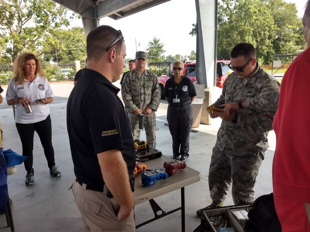 Sean Ramsey, Charleston County Emergency Management logistics officer, explains to Staff Sgt. John Lee from Joint Base Charleston’s Office of Emergency Management, various pieces of detection equipment vital to Charleston County's Weapons of Mass Destruction response team Aug. 23, 2018, at Charleston County's Department of Public Works.
