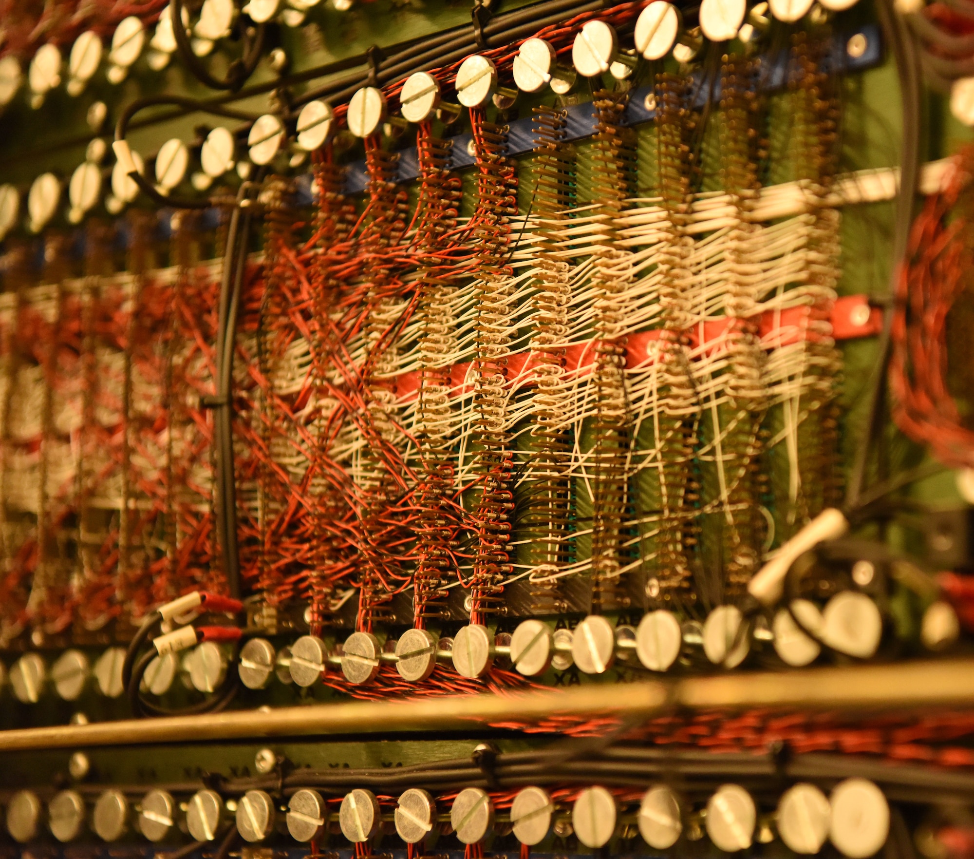 Wiring that controls the weapon systems trainer are displayed at Ellsworth Air Force Base, S.D., Aug. 21, 2018. The B-1 simulator is a state-of-the-art facility, which is powered by multiple different computers so it can display images and allow aircrew members to complete realistic training scenarios. (U.S. Air Force photo by Airman 1st Class Thomas Karol)