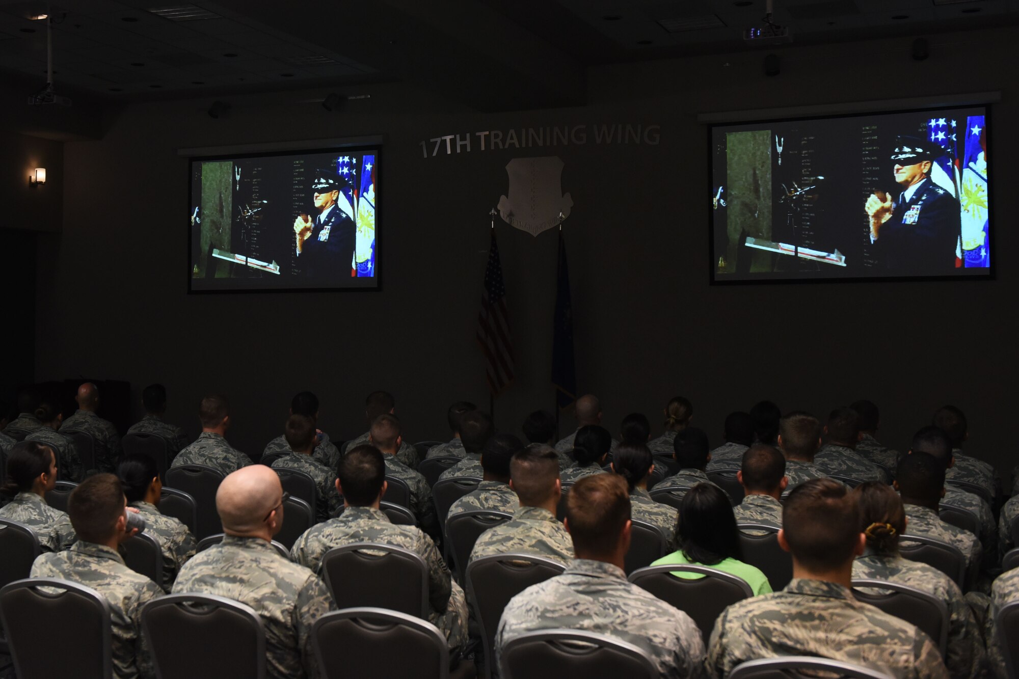 Service members join together to watch the live stream of U.S. Air Force Master Sgt. John Chapman’s Air Force Memorial Medal of Honor Unveiling Ceremony at the Event Center on Goodfellow Air Force Base, Texas, Aug. 24, 2018. Chapman is the first Airman to receive the Medal of Honor since the Vietnam War. (U.S. Air Force photo by Airman 1st Class Zachary Chapman/Released)