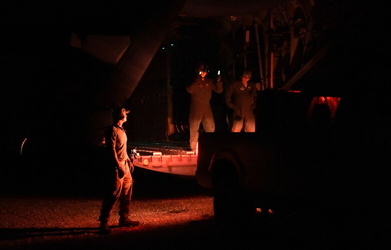 Airmen with the 621st Contingency Response Group load equipment from air drops onto a C-130 Hercules during training at Camp Branch Landing Zone in Logan County, W.Va., Aug. 22, 2018. The 621st CRG spent four days training with and working alongside the 130th Air National Guard at Camp Branch. (U.S. Air Force photo by Tech. Sgt. Jamie Powell)