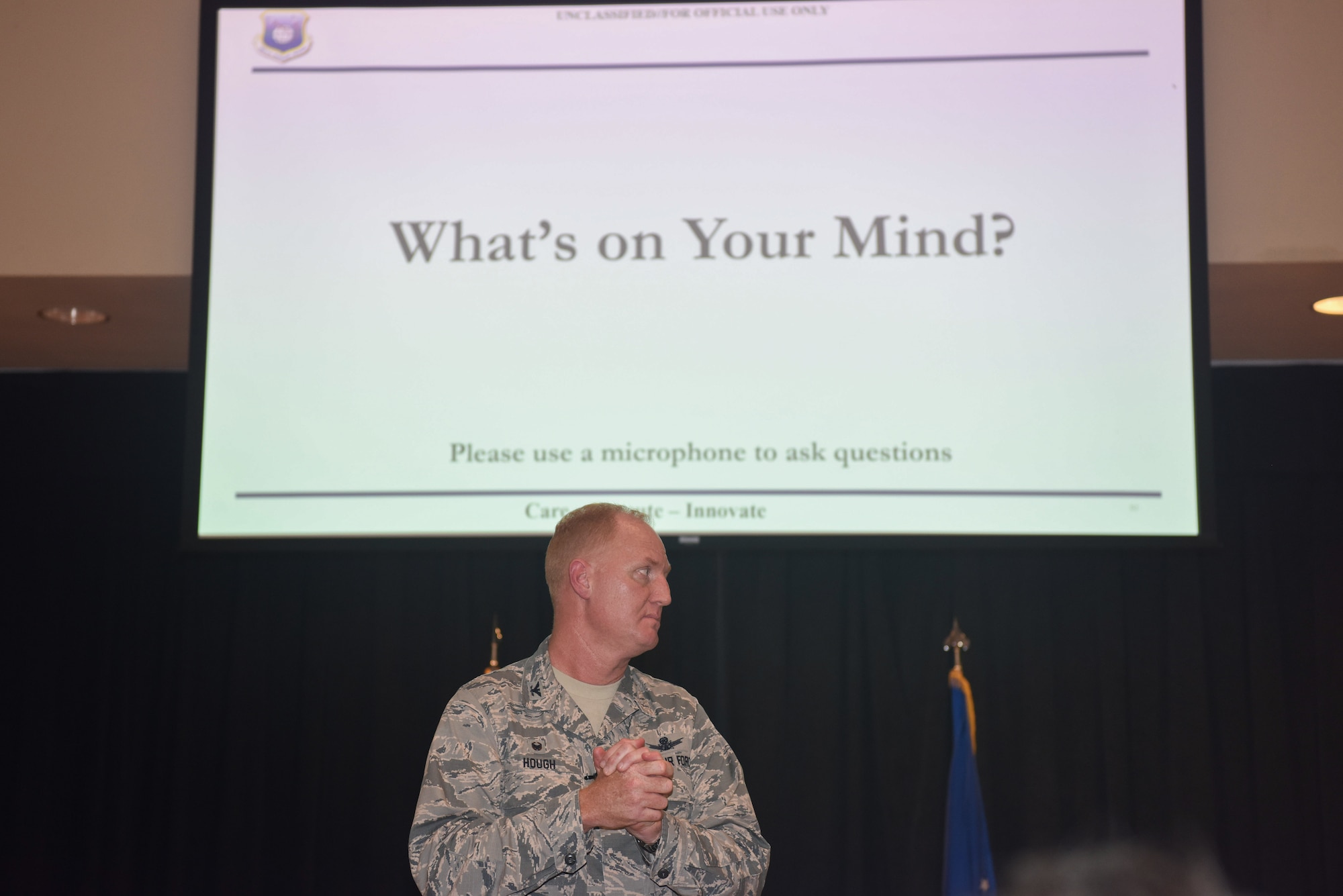 Col. Michael Hough, 30th Space Wing commander, hosts a commander's call Aug. 23 in the Pacific Coast Club at Vandenberg Air Force Base, Calif. Hough and his command chief spent time explaining the changes to the base and what's to come for Vandenberg during an all call.