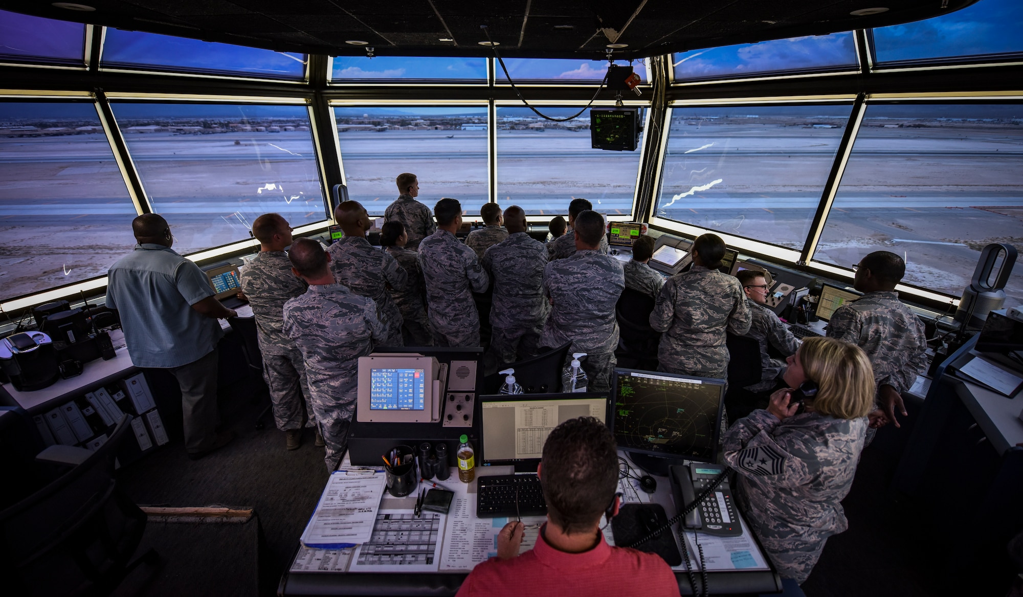 NCOs from units across the U.S. Air Force Warfare Center tour the air traffic control tower at Nellis Air Force Base, Nevada, Aug. 16, 2018. The tour was part of the Warrior Stripe program where technical sergeants toured parts of the base they would not regularly see in their daily job. (U.S. Air Force photo by Airman 1st Class Andrew D. Sarver)