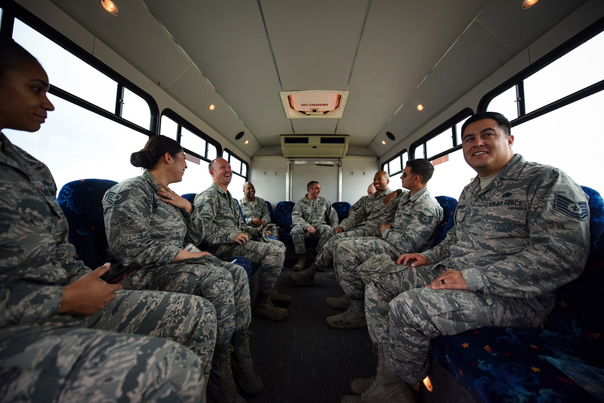 Air Force technical sergeants from units across the U.S. Air Force Warfare Center relax after their final tour of the day with the Warrior Stripe program at Nellis Air Force Base, Nevada, Aug. 16, 2018. The two-week course brought together 40 Warfare Center NCOs to provide an avenue for them to develop as military and professional leaders. (U.S. Air Force photo by Airman 1st Class Andrew D. Sarver)