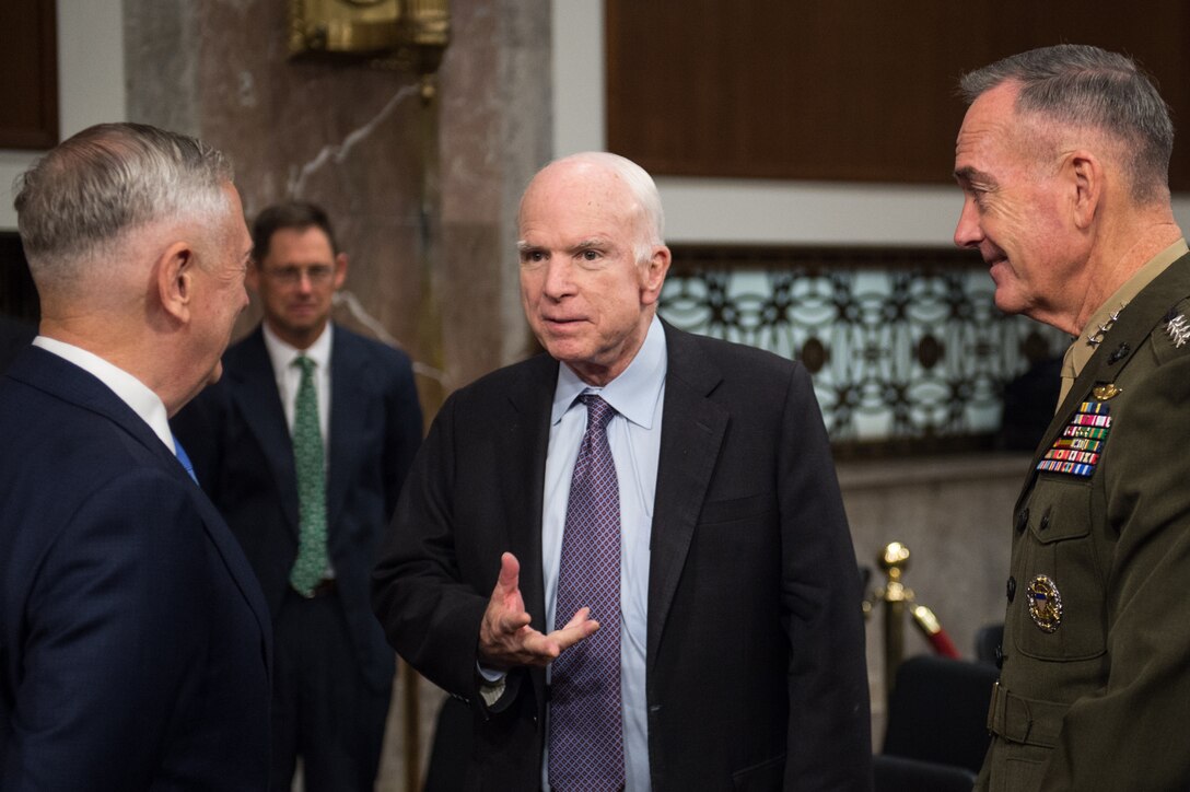Sen. John McCain greets Secretary of Defense Jim Mattis and U.S. Marine Corps Gen. Joseph F. Dunford, Jr., chairman of the Joint Chiefs of Staff, before a Senate Armed Services Committee hearing on Capitol Hill, Oct. 3, 2017. Mattis and Dunford testified about the political and security situation in Afghanistan.