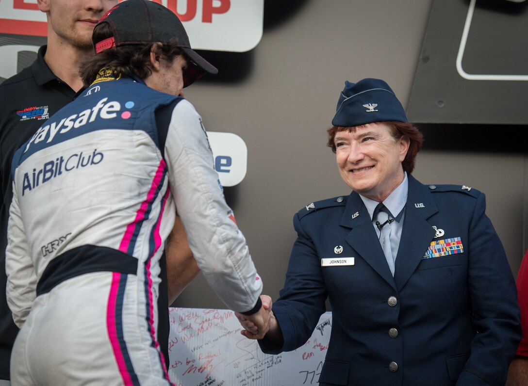 932nd MXG commander, Col. Sharon Johnson greets drivers for the Bommarito 500.
