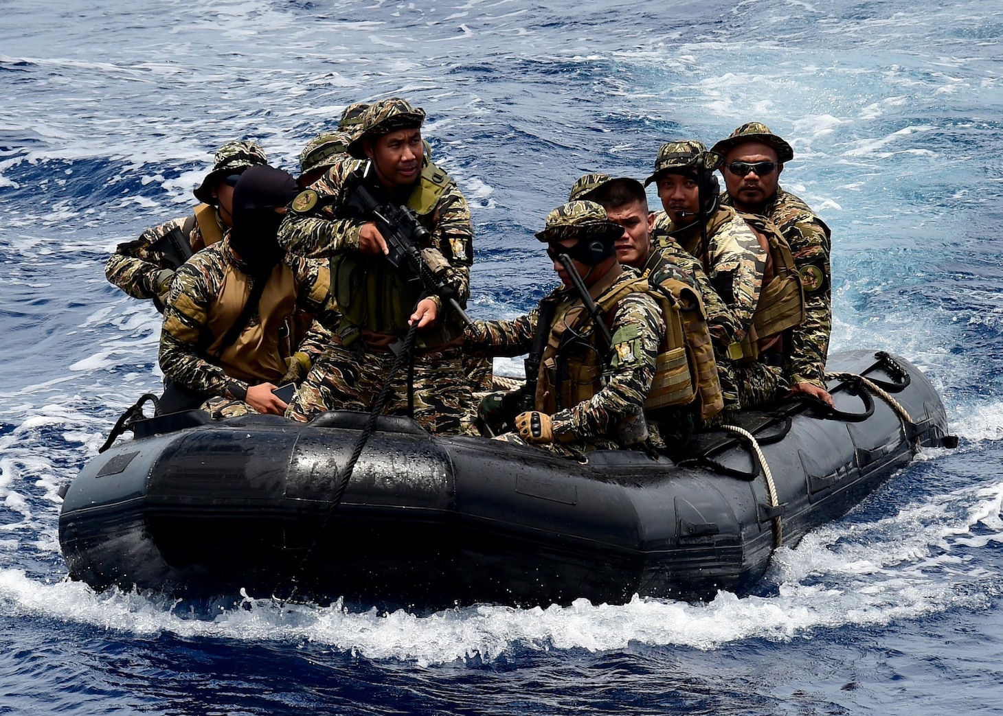 Members of the Philippine Naval Special Operations Group approach USNS Millinocket (T-EPF 3) while participating in Visit, Board, Search and Seizure (VBSS) training during South East Asia Cooperation and Training (SEACAT) 2017 in waters off the coast of Puerto Princesa, Philippines, Aug. 30.  2017 is the 16th annual SEACAT exercise and includes participants from the U.S. Coast Guard and Coast Guards and Coastal Patrol Agencies from the Philippines, Singapore, Vietnam, Malaysia, and Indonesia.
