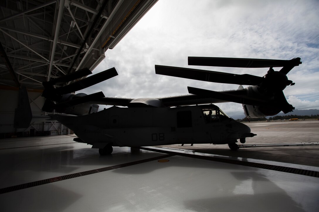 U.S. Marines park an MV-22 Osprey aircraft inside Hangar 7 prior to Hurricane Lane’s arrival at Marine Corps Air Station Kaneohe Bay, Marine Corps Base Hawaii, Aug. 22, 2018. For safety and protection of assets, U.S. Marines conduct hurricane preparations aboard the installation.